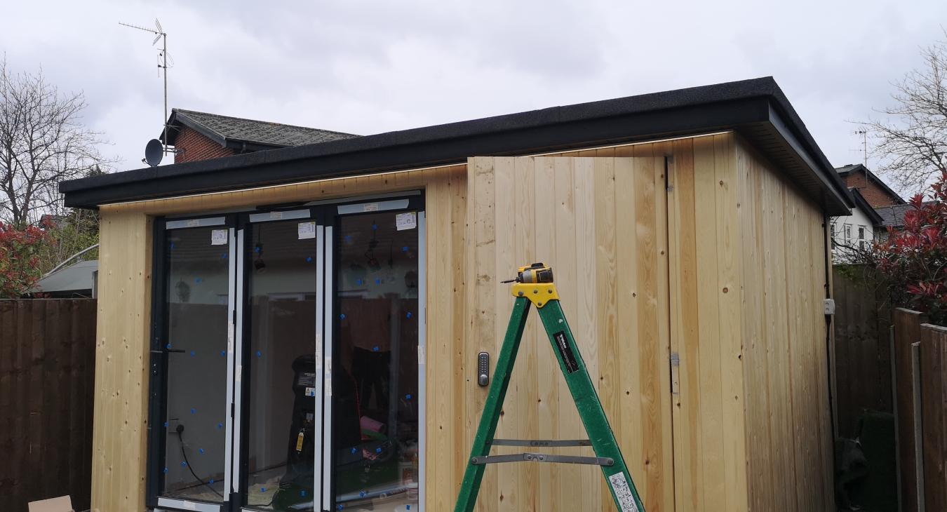 In this project, an experienced electrician from Full Circuit Solutions is seen installing lighting fixtures and setting up a reliable power supply in a stunning summerhouse garden office or cabin. The electrician's expertise ensures a safe and efficient electrical system, creating a well-lit and functional space for work or relaxation